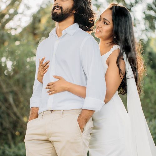 Portrait of a confident man in sportswear smiling lightly.
